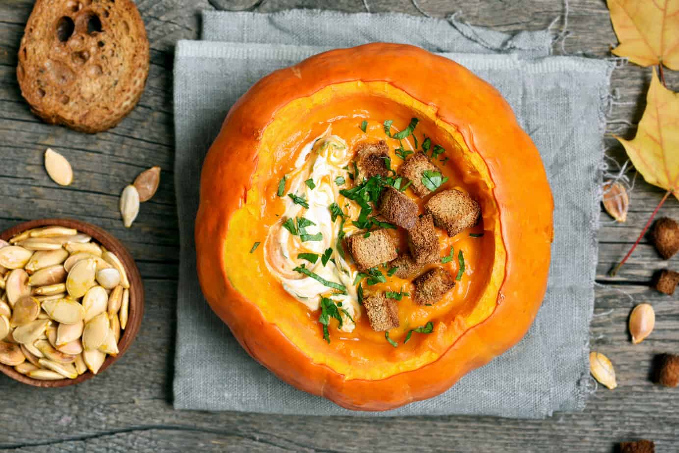 soup being served in a pumpkin