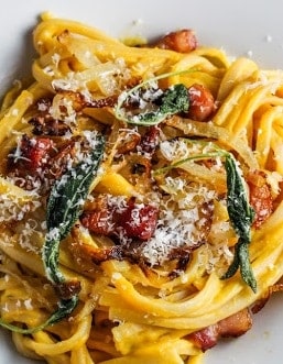 butternut squash carbonara pasta with fried sage garnish