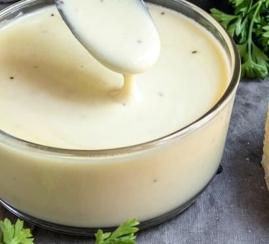 a bowl of cauliflower alfredo sauce