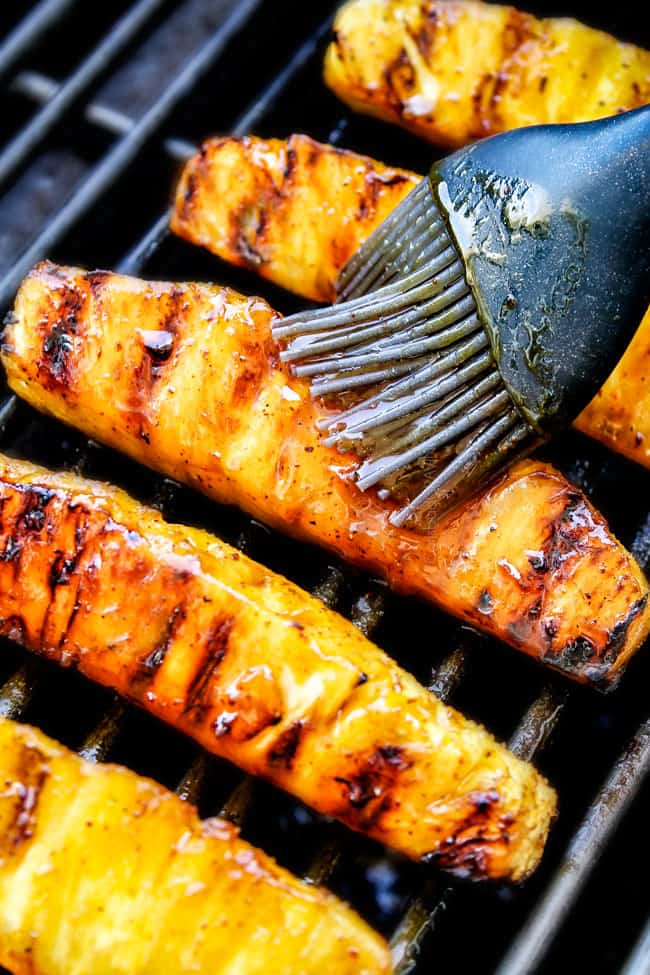 pineapple on the grill with a sticky caramelized glaze on it. The perfect grilled pineapple recipe