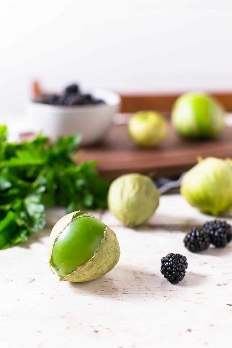 fresh tomatillos and blackberry leftover ingredients about to be repurposed