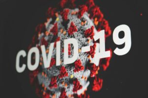 red white and black COVID 19 logo